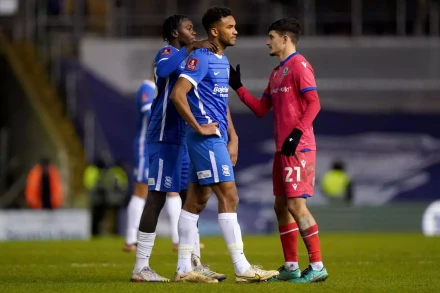 Birmingham City's Auston Trusty is consoled at full time after scoring an own goal