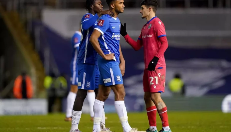 Birmingham City's Auston Trusty is consoled at full time after scoring an own goal