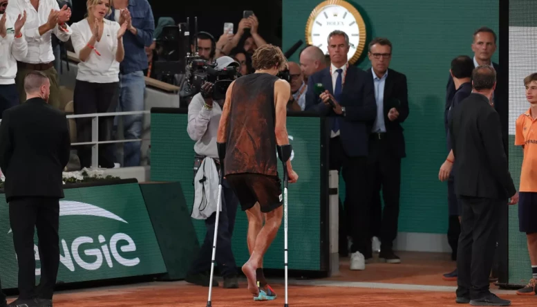 Alexander Zverev (GER) takes a fall and leaves the court on crutches during the match against Rafael Nadal (ESP)
