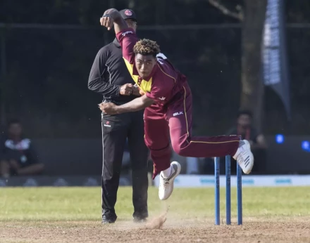 West Indies  Obed McCoy bowls