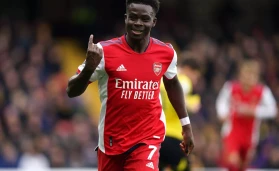 Arsenal's Bukayo Saka celebrates scoring their side's second goal of the game during the Premier League match
