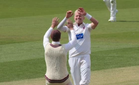Somerset’s Peter Siddle celebrates after getting the wicket of Reece Topley to finish with 6 wickets in the innings as Surrey take on Somerset