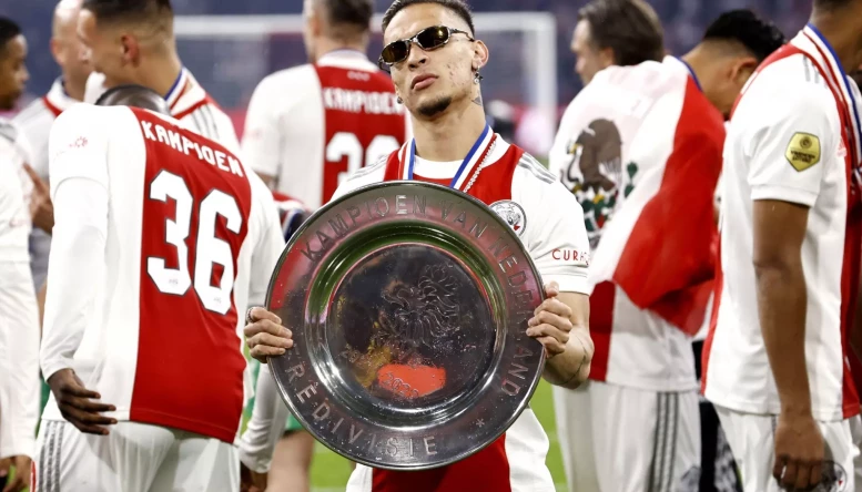 Antony Matheus Dos Santos of Ajax with the championship scale celebrates winning the 36th Dutch Eredivisie title