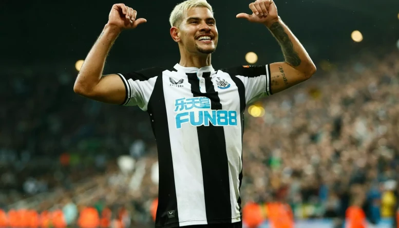 Burno Guimaraes of Newcastle United celebrates after scoring their sides second goal during the Premier League match between Newcastle United and Arsenal at St. James's Park