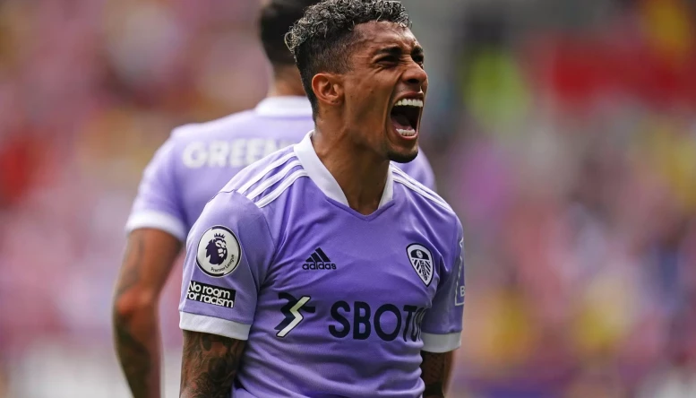 Leeds United's Raphinha celebrates scoring their side's first goal of the game from the penalty spot during the Premier League match at The Brentford Community Stadium