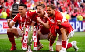 Nottingham Forest's Joe Lolley (left), Ryan Yates and Philip Zinckernagel celebrate winning promotion to the Premier League