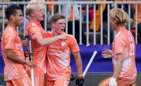 Tjep Hoedemakers of the Netherlands celebrates with Koen Bijen of the Netherlands and Jip Janssen of the Netherlands after scoring his sides fifth goal during the FIH Pro League match between