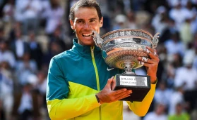 Rafael NADAL of Spain celebrates his victory with the trophy during the Day fifteen of Roland-Garros 2022