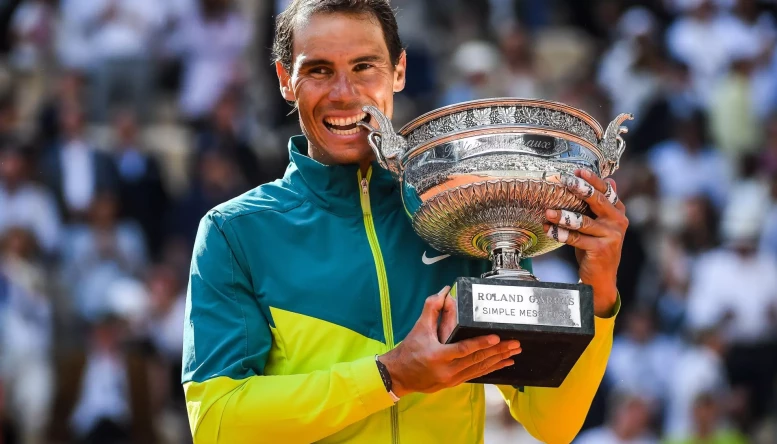 Rafael NADAL of Spain celebrates his victory with the trophy during the Day fifteen of Roland-Garros 2022