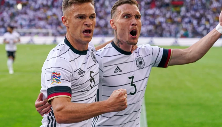 Joshua Kimmich of Germany celebrating goal during the UEFA Nations League match between Germany and Italy at Borussia-Park on June 14, 2022 in Mönchengladbach, Germany
