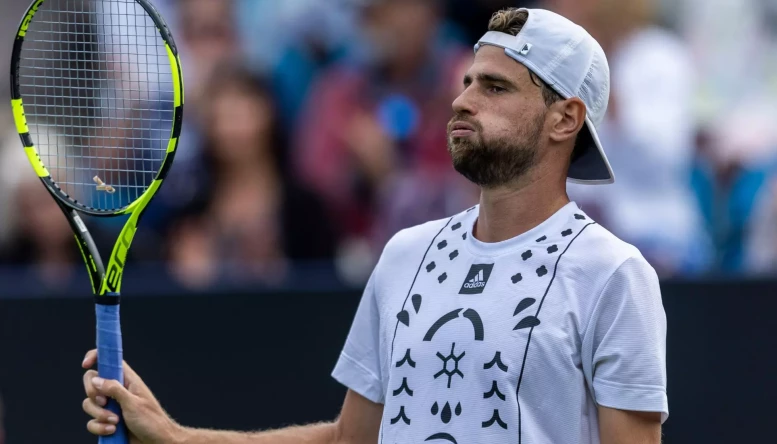 Maxime Cressy bounces from a set down to lift his first ATP trophy