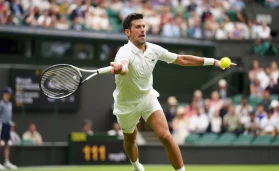 Novak Djokovic in action against Soon Woo Kwon on day one of the 2022 Wimbledon Championships at the All England Lawn Tennis and Croquet Club, Wimbledon