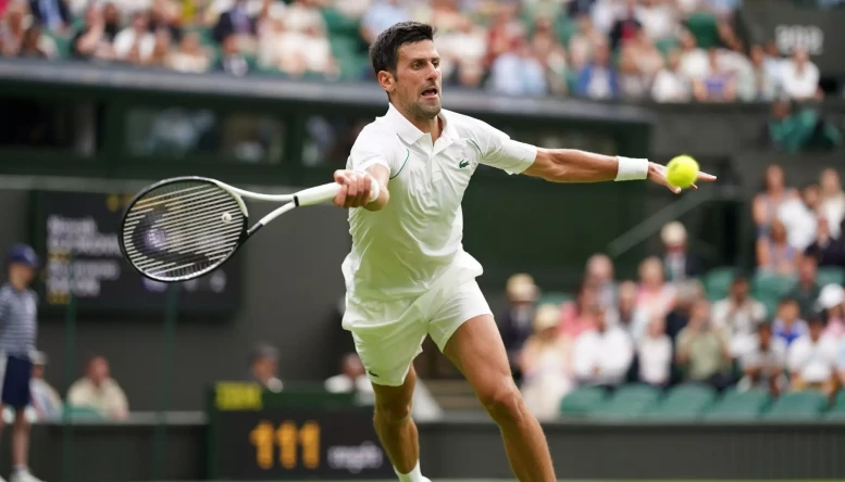 Novak Djokovic in action against Soon Woo Kwon on day one of the 2022 Wimbledon Championships at the All England Lawn Tennis and Croquet Club, Wimbledon
