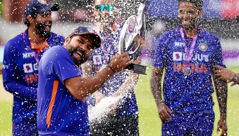 India's Rohit Sharma with the trophy after his side won the series 2-1 against England following the third one day international match at the Emirates Old Trafford, Manchester