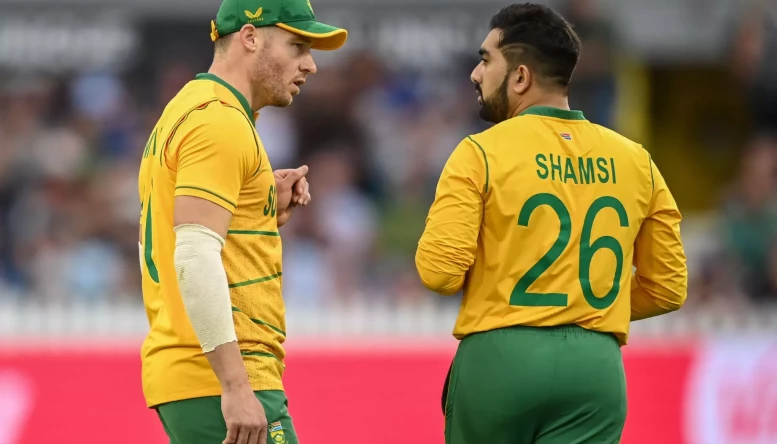 David Miller of South Africa speaks to Tabraiz Shamsi of South Africa