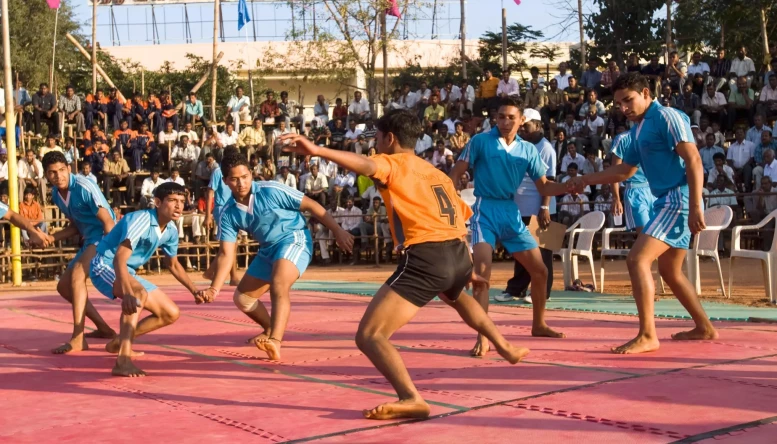 Boys playing Kabaddi game Coimbatore Tamil Nadu India