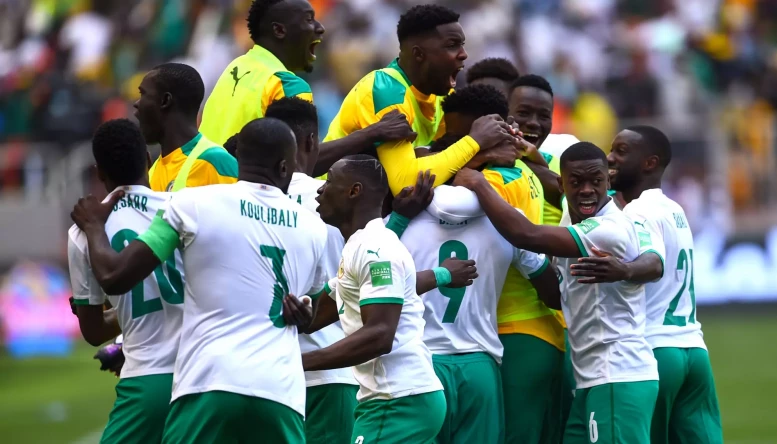Senegal Team celebrating after shutting out Egypt