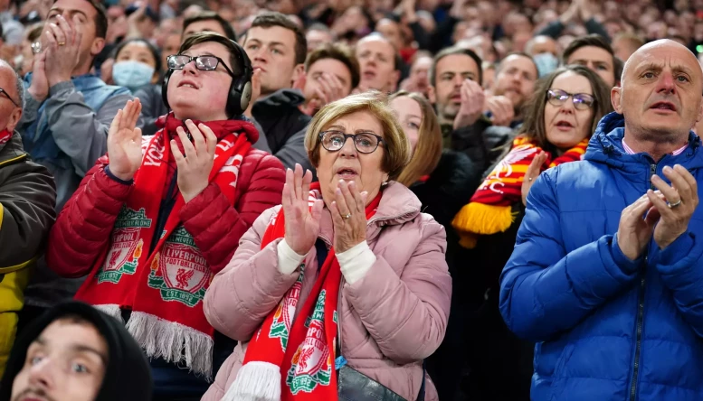 Liverpool fans clap on the 7th minute in mark or respect to Cristiano Ronaldo following the death of his new-born son during the Premier League match at Anfield