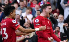 Liverpool's Andrew Robertson (right) celebrates scoring their side's first goal of the game with team-mate Luis Diaz during the Premier League match at Anfield, Liverpool