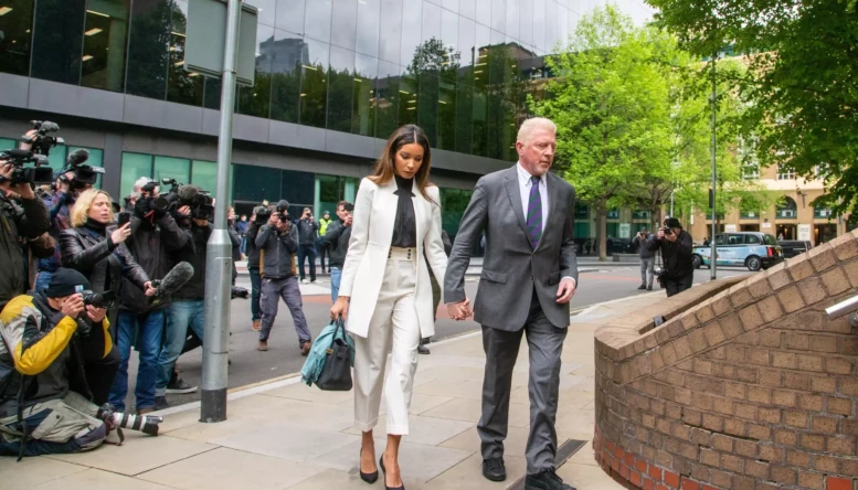 Former German tennis star BORIS BECKER with his partner LILIAN DE CARVALHO MONTEIRO arrives at Southwark Crown Court in London for sentencing.