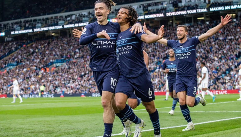 Premier League Leeds United v Manchester City Nathan Ake 6 of Manchester City celebrates his goal with Jack Grealish