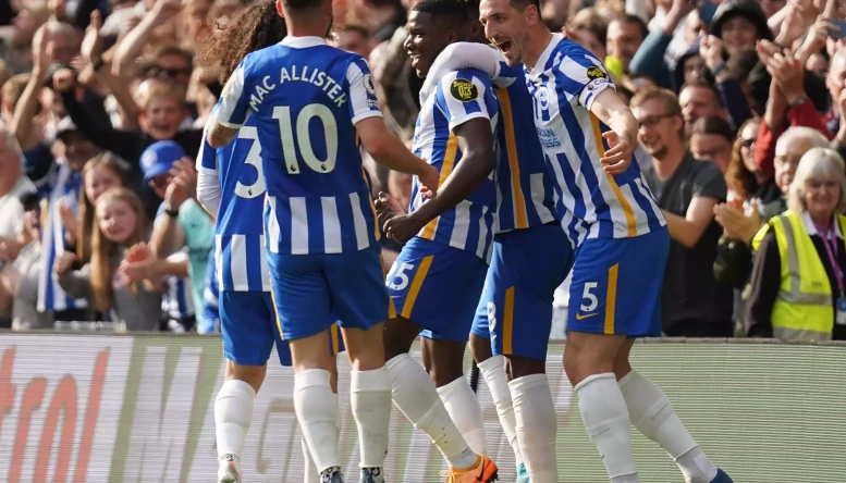 Brighton and Hove Albion's Moises Caicedo (centre) celebrates with team-mates after scoring their side's first goal of the game during the Premier League match at the AMEX Stadium, Brighton