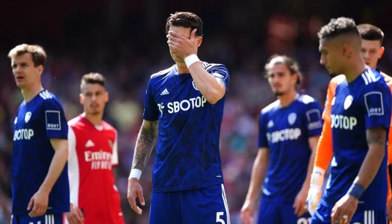 Leeds United's Robin Koch (centre) reacts during the Premier League match at the Emirates Stadium, London.