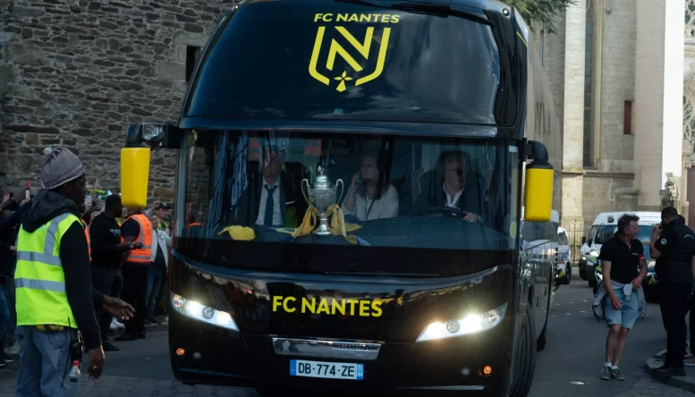 After their victory against OGC Nice, during the final of the French Football Cup, the players of FC Nantes presented their trophy in front of their supporters. Nantes, France