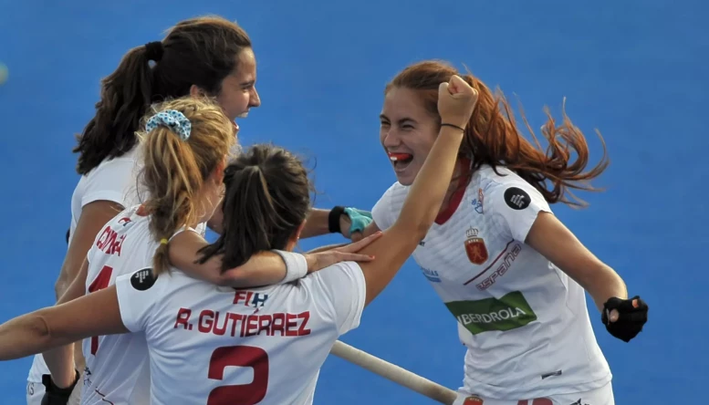 The Spanish players celebrate at the end of the game