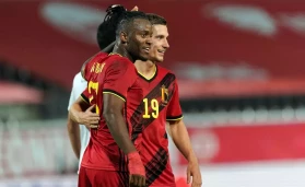 Michy Batshuayi celebrates after scoring Belgium's winner against Poland