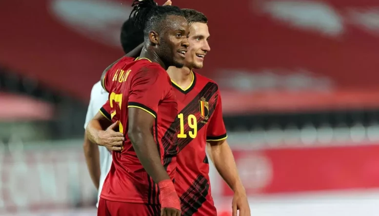 Michy Batshuayi celebrates after scoring Belgium's winner against Poland