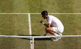 Novak Djokovic’s Tradition of eating grass after Winning