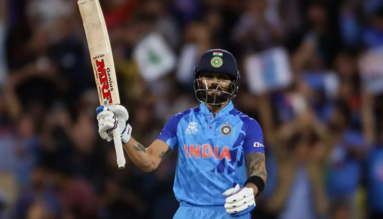 India's Virat Kohli raises his bat