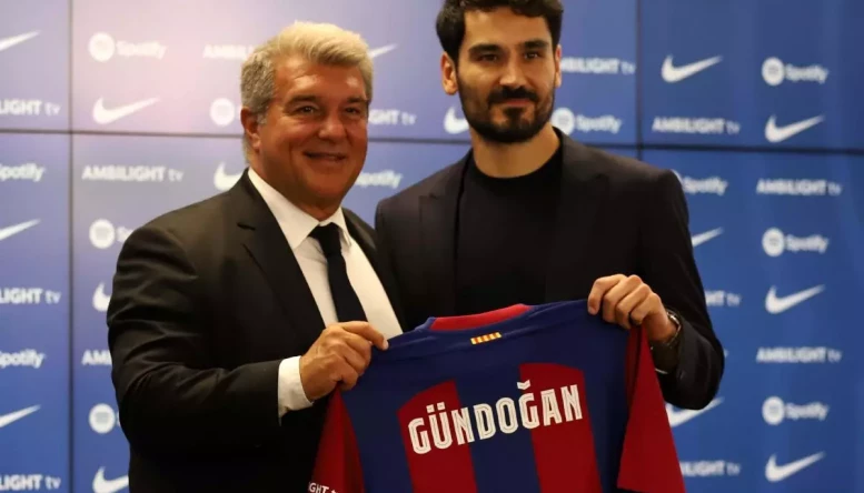 Joan Laporta and Ilkay Gundogan.