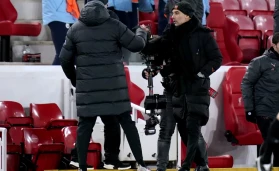 Jurgen Klopp and Pep Guardiola fist bump after the most recent match between the side's