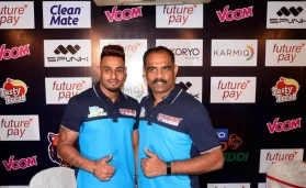 Maninder Singh (left) and coach BC Ramesh (right)