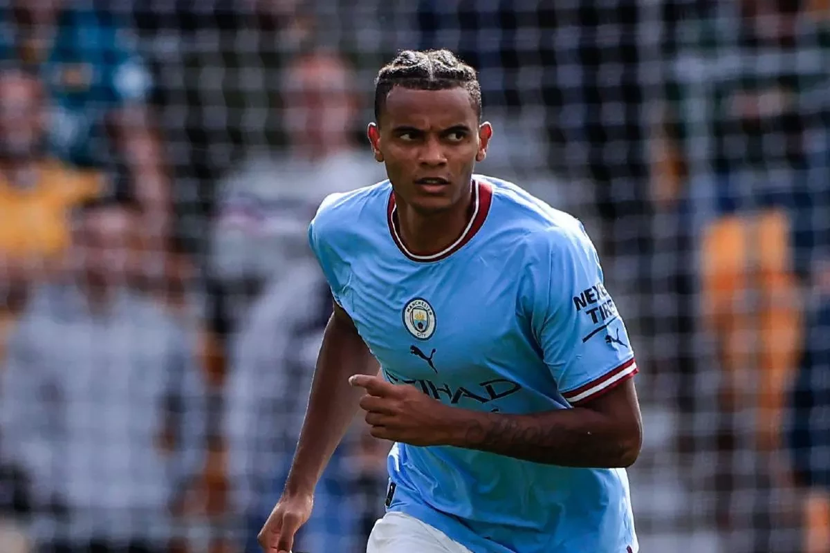 Manchester City's Manuel Akanji heads the ball during the