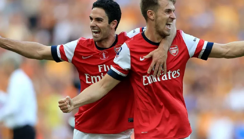 Mikel Arteta and Aaron Ramsey.