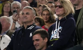 Novak Djokovic's father and mother.