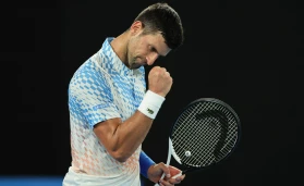 Novak Djokovic celebrates after defeating Alex de Minaur