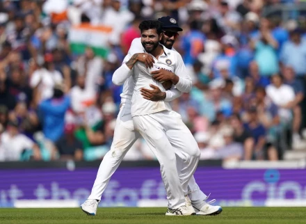 Ravindra Jadeja celebrates the wicket of England's Moeen Ali